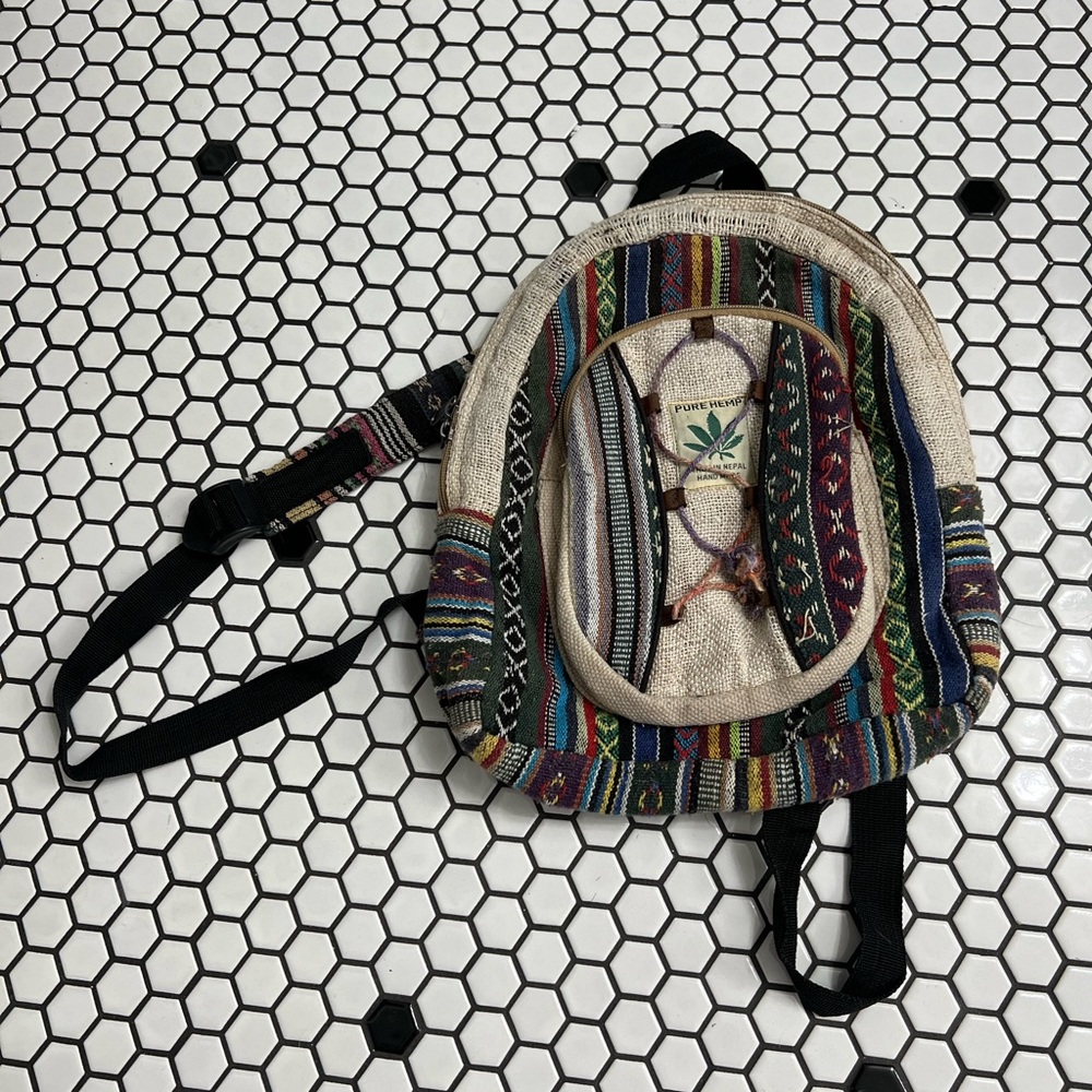 Pure hemp made in Nepal handmade backpack with some loose stitching